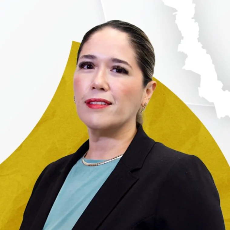Professional portrait of an Asian woman wearing a black blazer and light blue shirt against a yellow and white geometric background